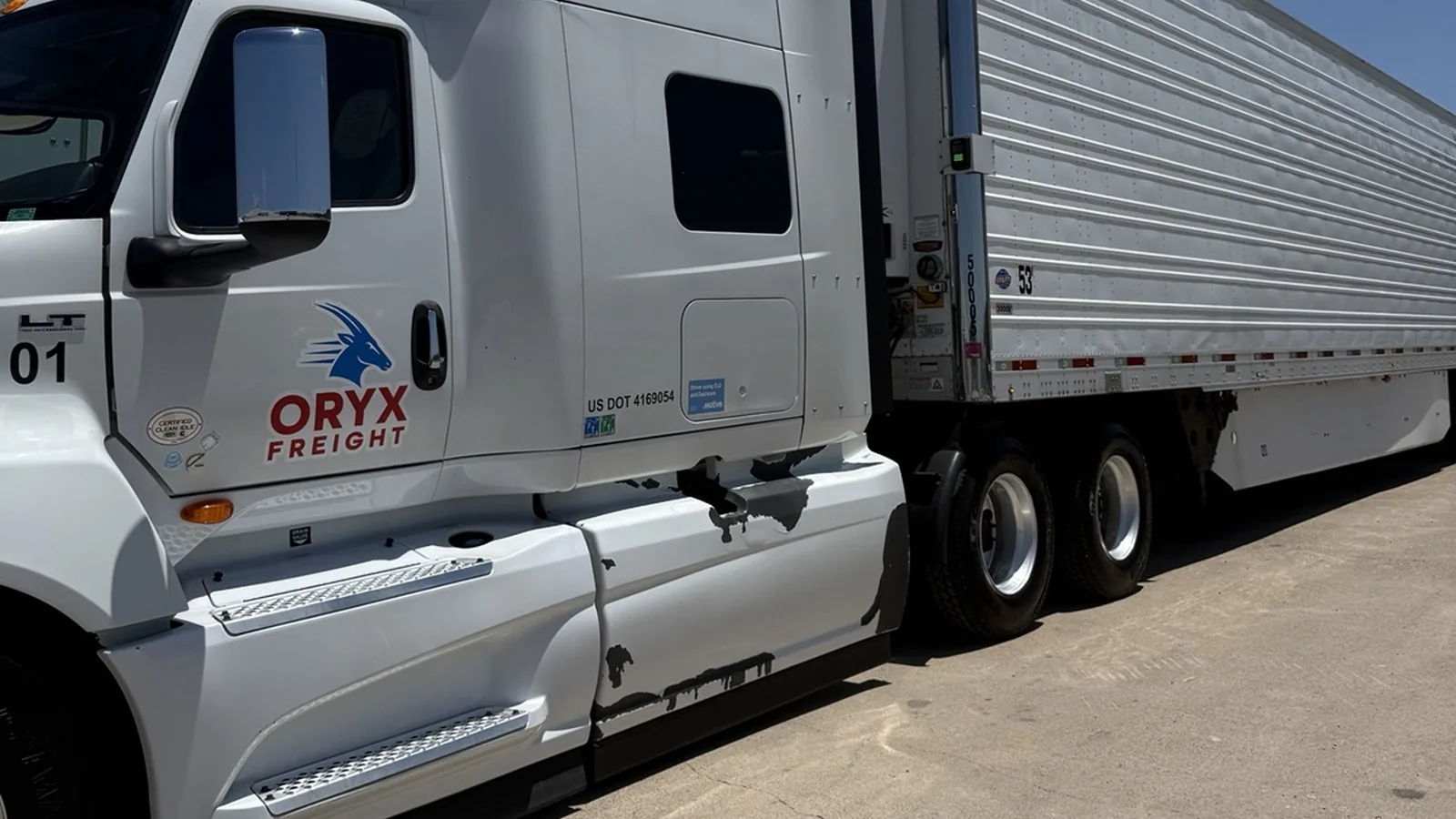 Side view of Oryx Freight tractor and trailer